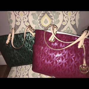 Micheal kors one green one red sold together
